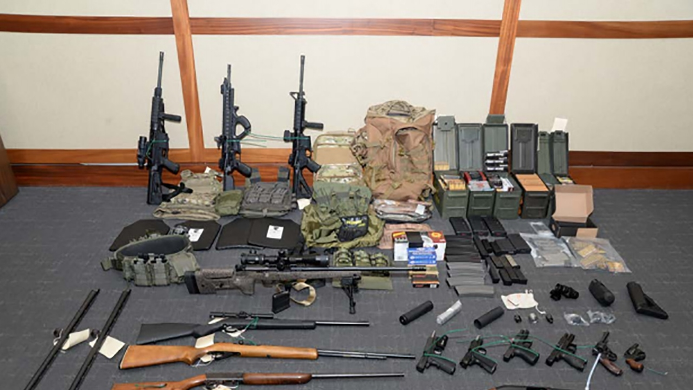 Horizontal This undated image released by the US Attorney's Office on February 20, 2019, shows weapons seized at the Silver Spring, Maryland, home of US Coast Guard officer Christopher Paul Hasson. - Hasson, who espoused white supremacist views and drafte