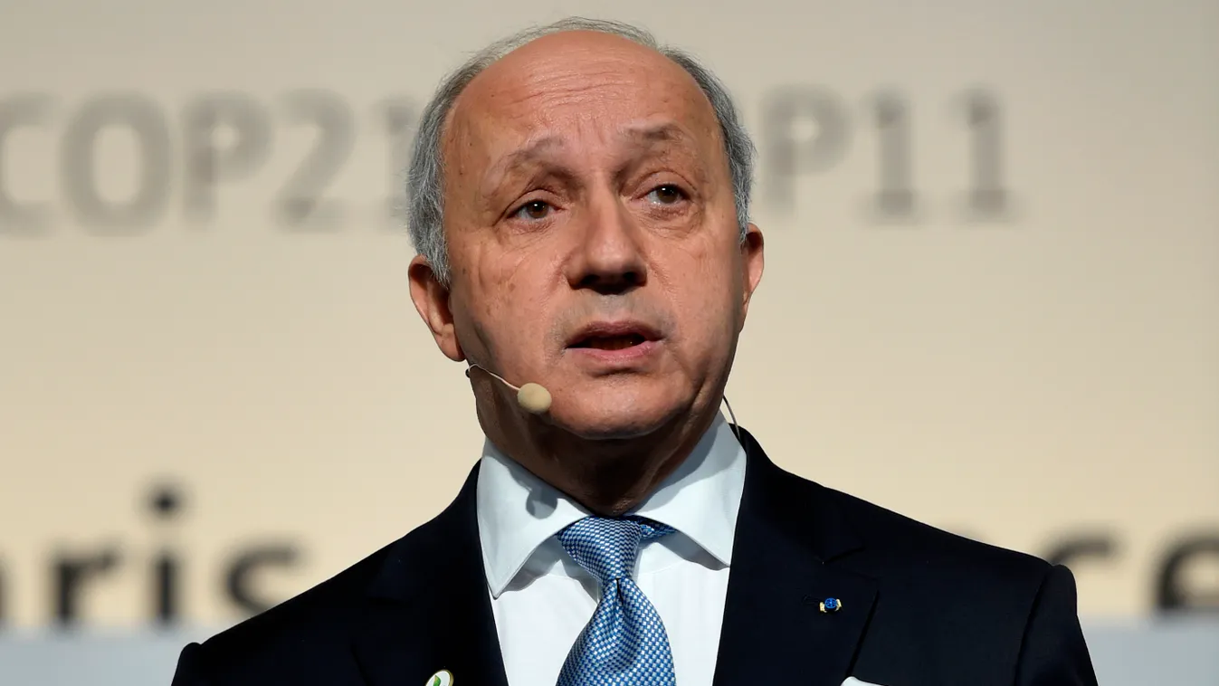 Vertical Laurent Fabius, former French prime minister and president of the COP21, delivers a speech during the opening of "Action Day" at the COP21 United Nations conference on climate change in Le Bourget on December 5, 2015. AFP PHOTO / ERIC FEFERBERG /