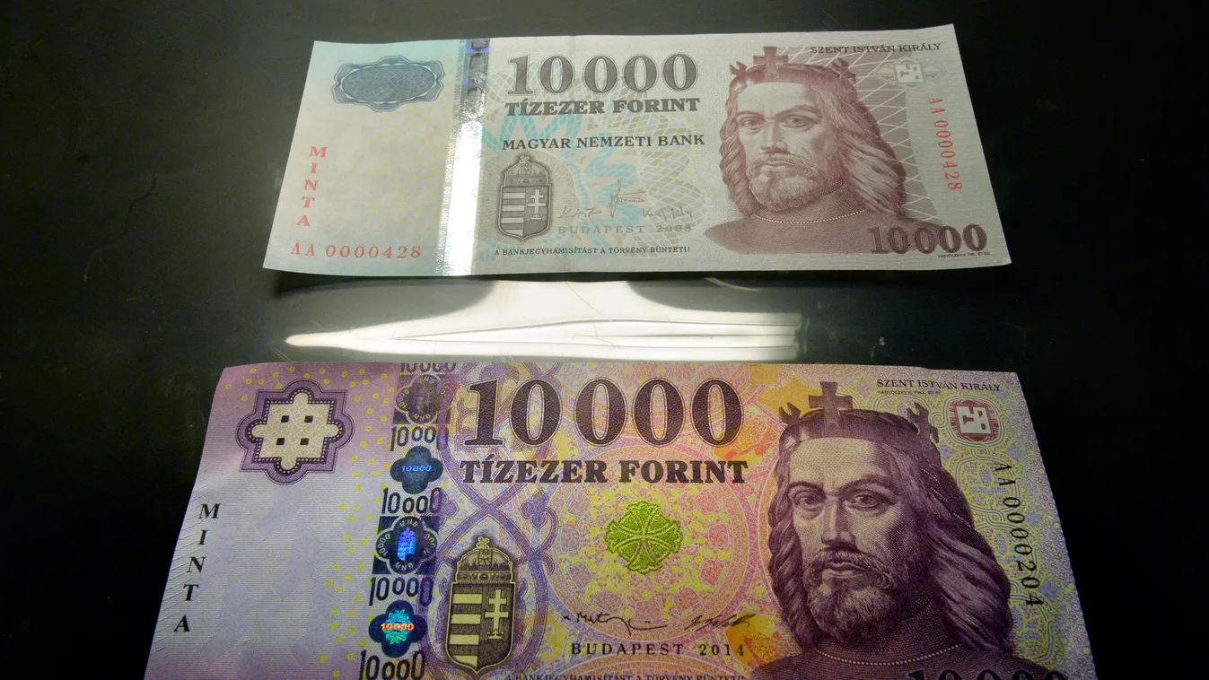 bankjegy minta FOTÓ ÁLTALÁNOS korábbi bankjegy Szent István király-kép tízezer forint tízezer forintos bankjegy minta Budapest, 2014. szeptember 1.
Az új tízezer forintos bankjegy mintája látható egy tárlóban a új tízezres 