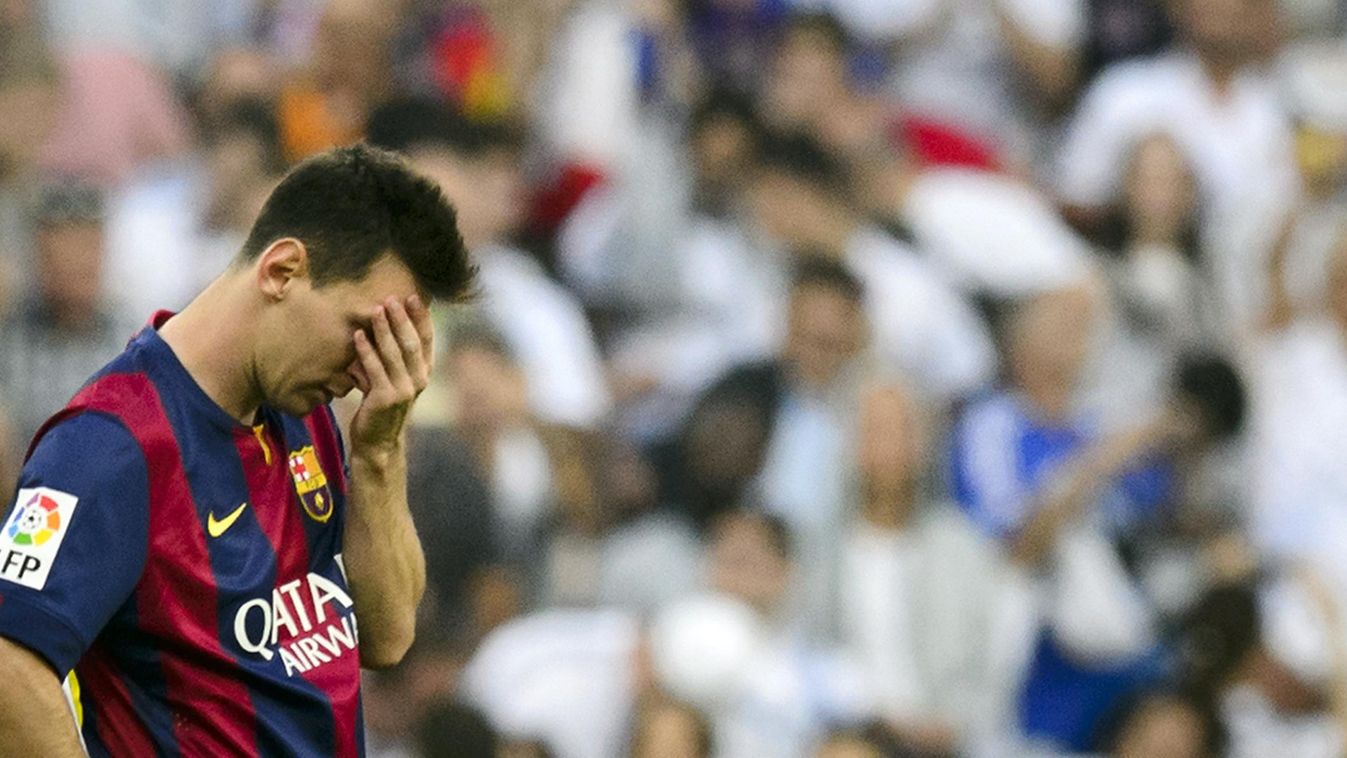 504075869 Barcelona's Argentinian forward Lionel Messi gestures during the Spanish league "Clasico" football match Real Madrid CF vs FC Barcelona at the Santiago Bernabeu stadium in Madrid on October 25, 2014.   AFP PHOTO / DANI POZO 