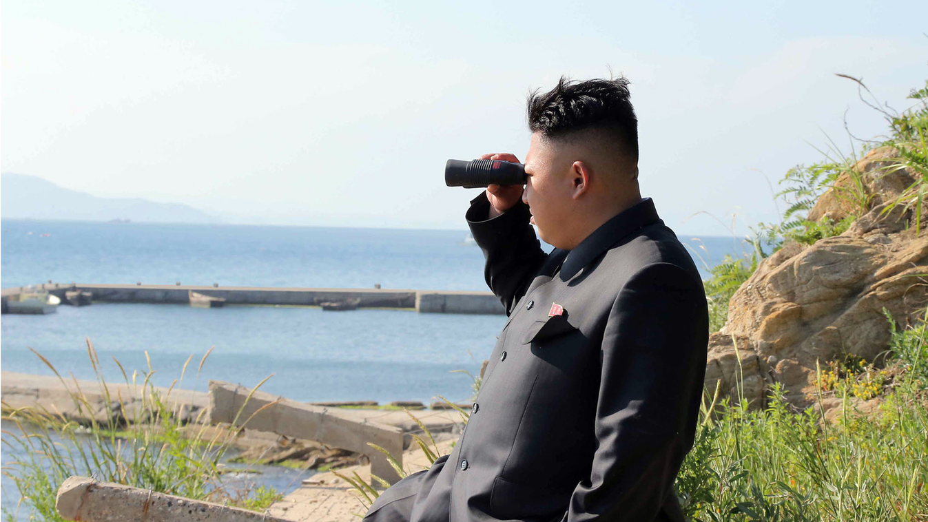 North Korean leader Kim Jong-Un inspecting the defence detachment on Ung Islet, defending an outpost in the East Sea of Korea.   AFP PHOTO / Kim Dzsong Un tenger 