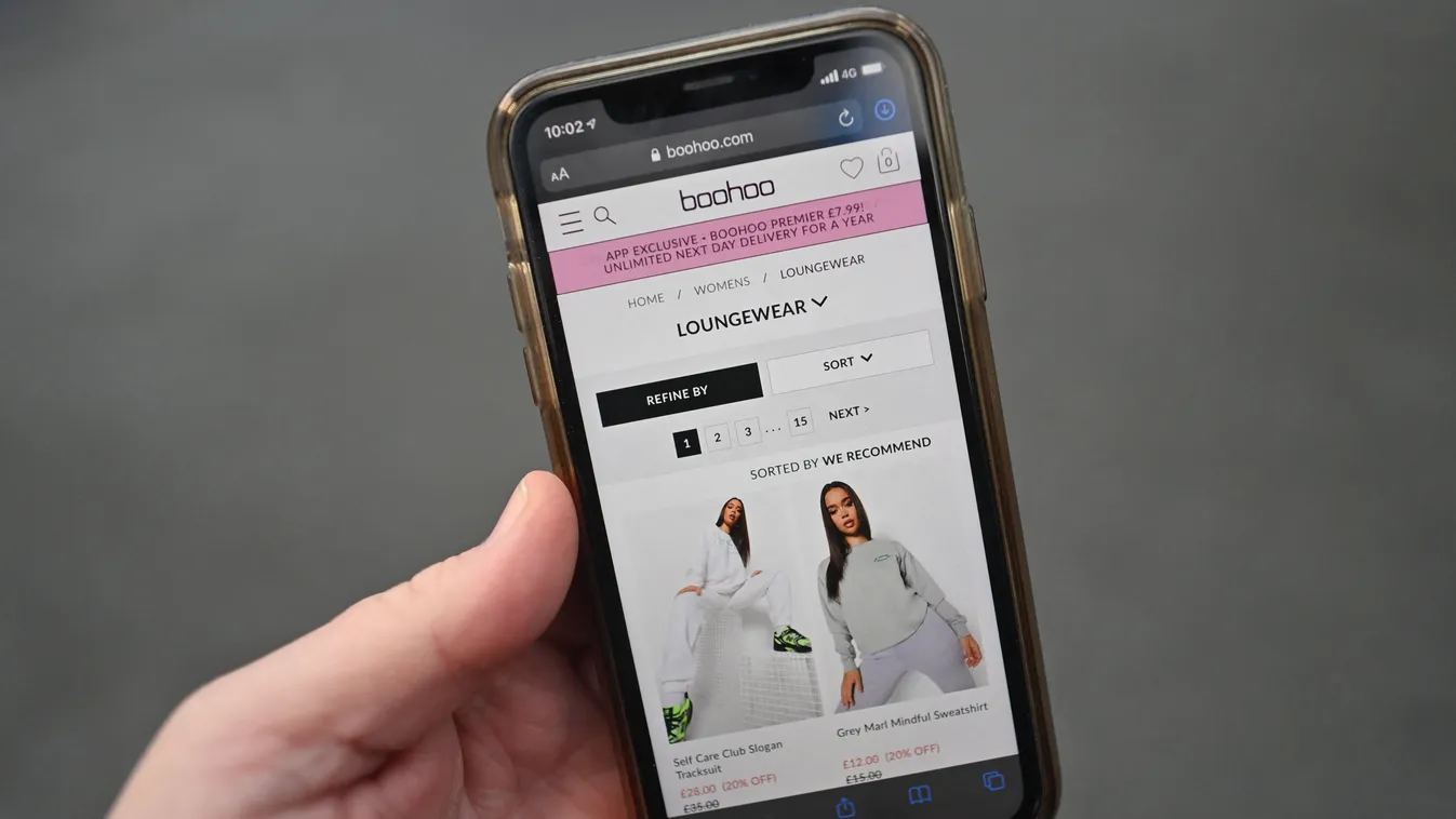 Horizontal SCREEN E-COMMERCE DIGITAL ECONOMY WEB SITE SMARTPHONE INTERNET A posed photograph taken as an illustration in Lancaster, northwest England, on January 25, 2021 shows the website of fashion retailer Boohoo displayed on a mobile phone. - UK depar