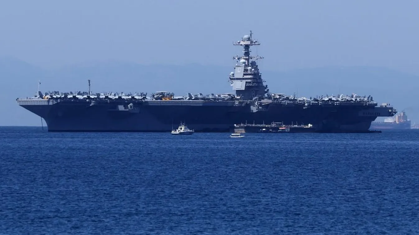 The U.S. aircraft carrier Gerald R. Ford passes shore of the Piraeus suburb, in Athens 2023,aircraft,Athens,Gerald R. Ford,Greece,PASS,Piraeus suburb,s Horizontal 