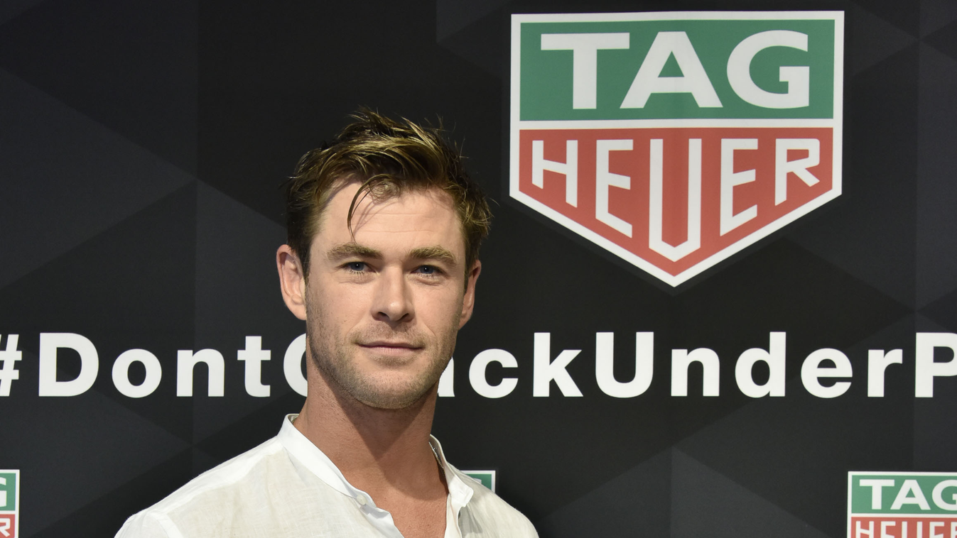 TAG Heuer Celebrates The 102nd Running Of The Indianapolis 500 Race As The Official Timepiece With Brand Ambassador, Chris Hemsworth GettyImageRank2 Run People Instrument of Time VERTICAL Looking At Camera THREE QUARTER LENGTH SUNGLASSES Motorsport Auto R