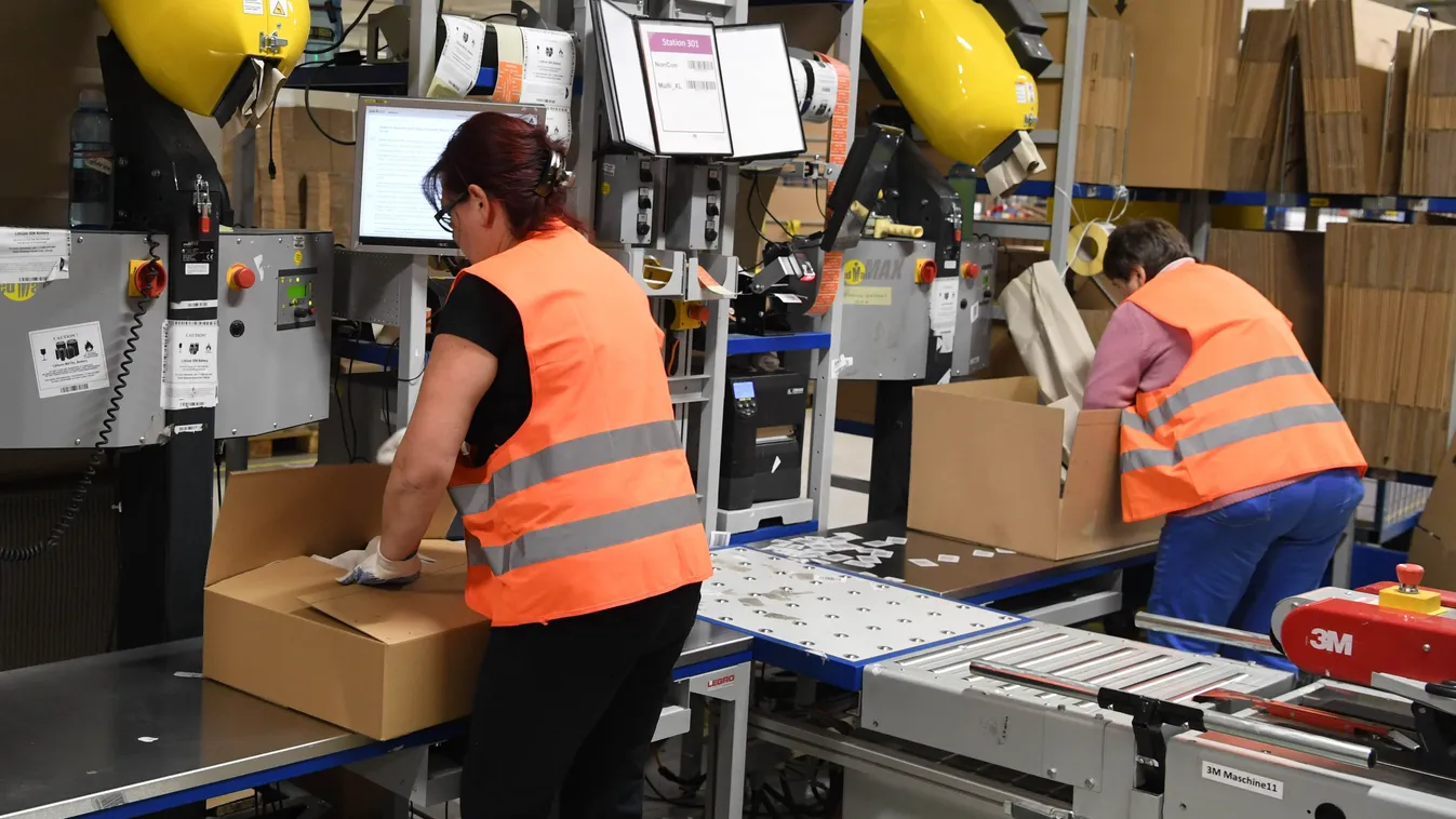 amazon online retail mail order CHRISTMAS Packages are prepared for delivery at the Amazon logistics centre in Pforzheim, Germany, 1 December 2016. The world's largest mail order company has prepared for Christmas trade, with 500 seasonal workers at its P