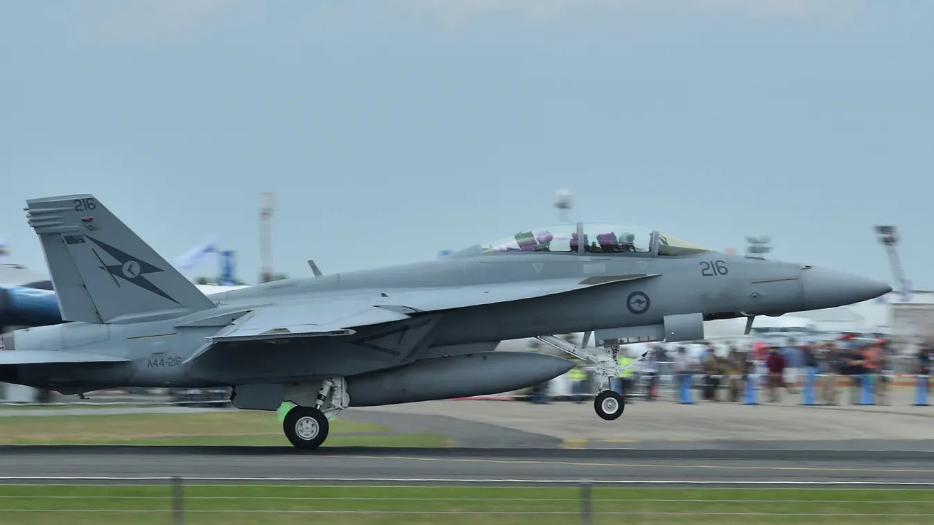 A Royal Australian Air Force FA-18 Hornet takes off past the crowd during the Australian International Airshow at the Avalon Airfield near Lara southwest of Melbourne on February 27, 2015. Some 180,000 patrons were expected through the gates over three pu