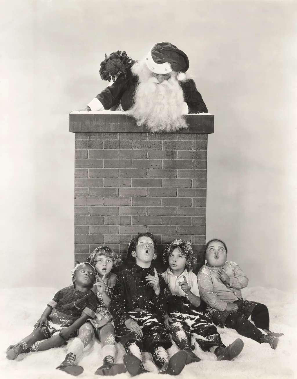 Children,Sitting,Against,Chimney,Looking,At,Santa,Claus 1920s,1910s,1940s,chimney,boys,historical,togetherness,winter,ve 