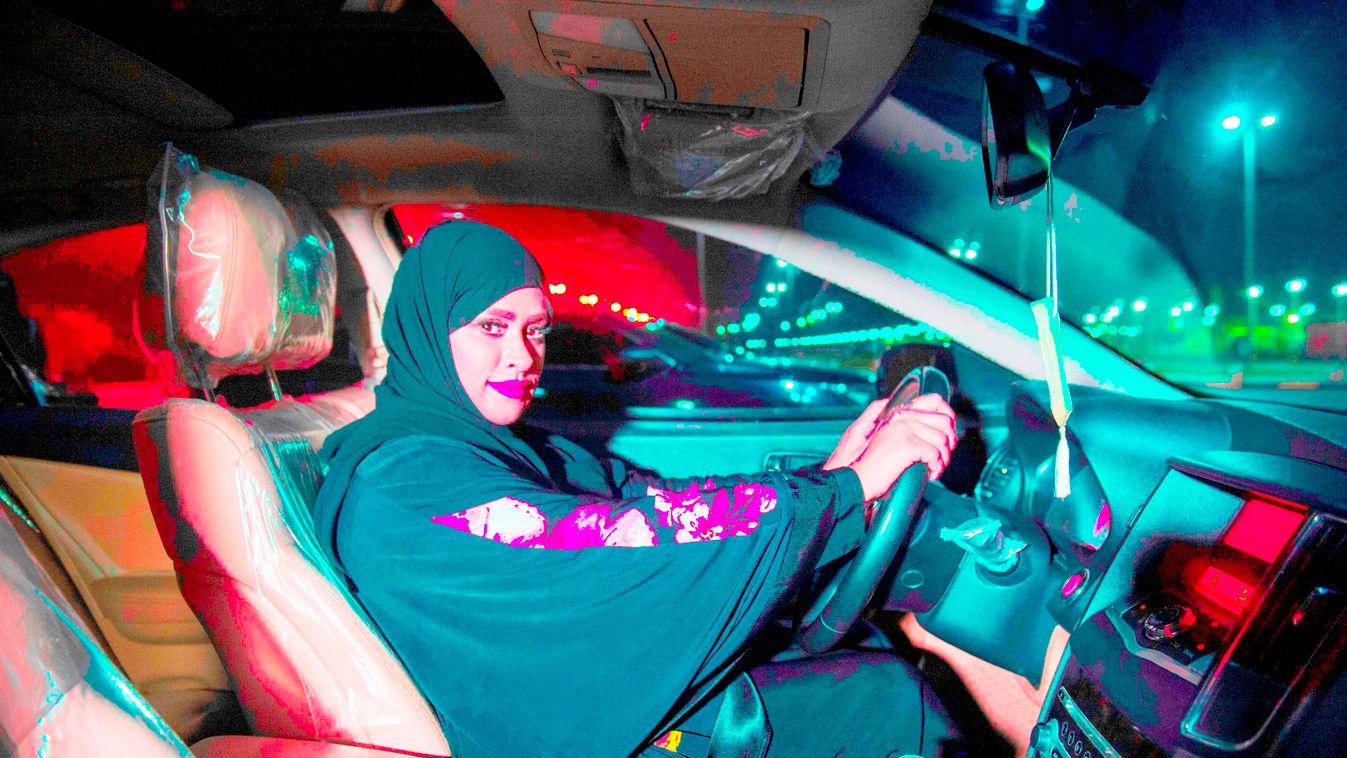 Horizontal Saudi woman Sabika Habib is ready to drive her car through the streets of Khobar City on her way to Kingdom of Bahrain. For the first time little after midnight on June 24, 2018, the law allows women to drive.
Saudi Arabia will allow women to d