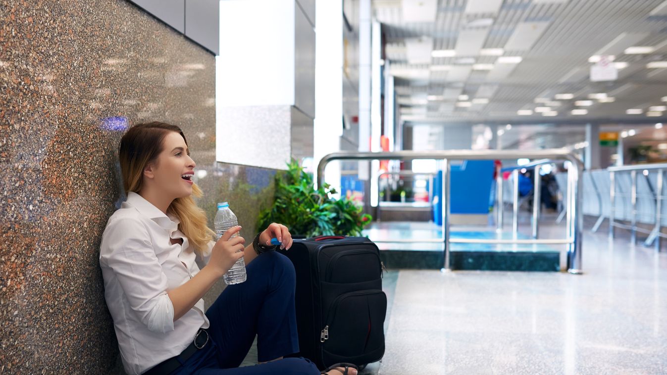 refreshing while the time pass Beautiful Luggage Travel People Traveling Tourism Businesswoman Portrait Females Water Bottle Arrival Airport Lounge Arrival Departure Board 20-29 Years Young Adult Smiling Sitting Waiting Looking Drinking Leaving Holding Re
