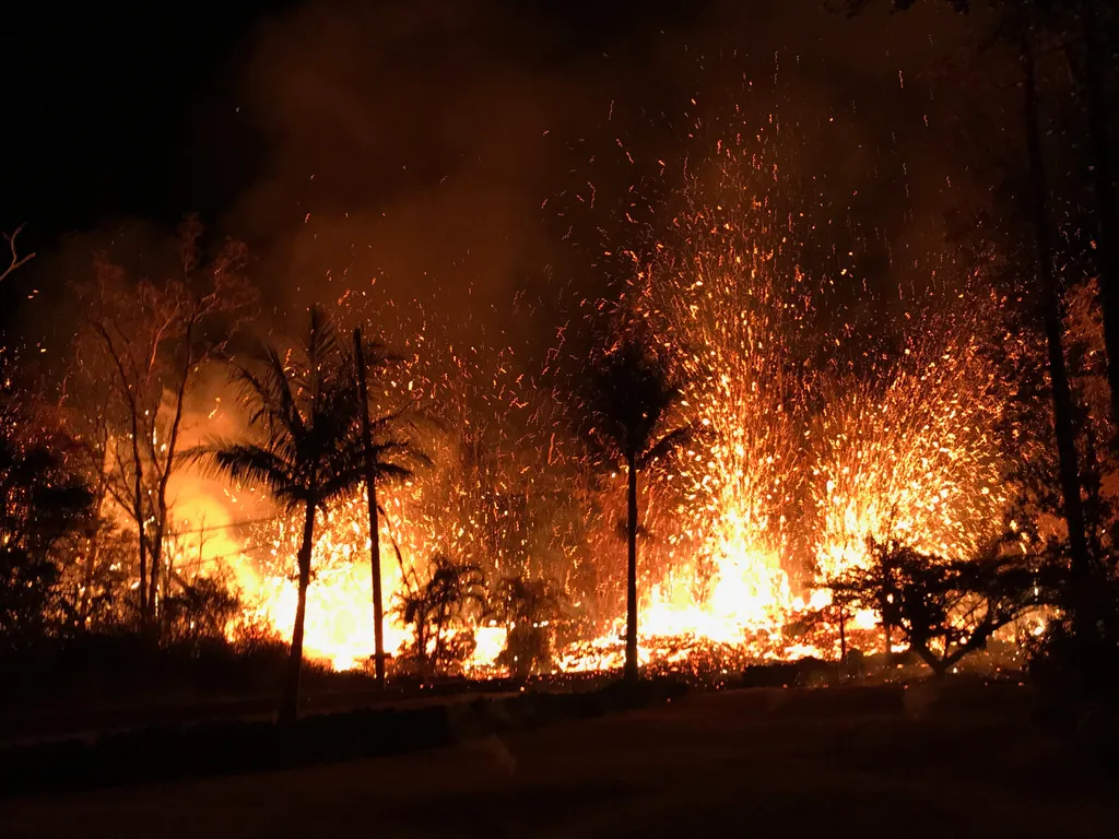 This image released by the US Geological Survey shows a volcanic fissure with  lava fountains as high as about 70 m (230 ft) in Leilani Estates, Hawaii, on May 5, 2018.
The Kilauea Volcano, the most active in Hawaii, was highly unstable on May 6, 2018, as