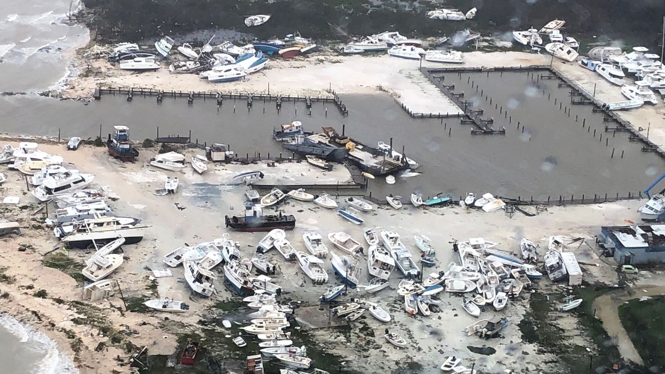 weather TOPSHOTS Horizontal In this image courtesy of US Coast Guard Air Station Clearwater, boats are strewn across a marina in in Andros Island, Bahamas, on September 2, 2019, as Hurricane Dorian makes its way across the Bahamas. - Dorian crept towards 