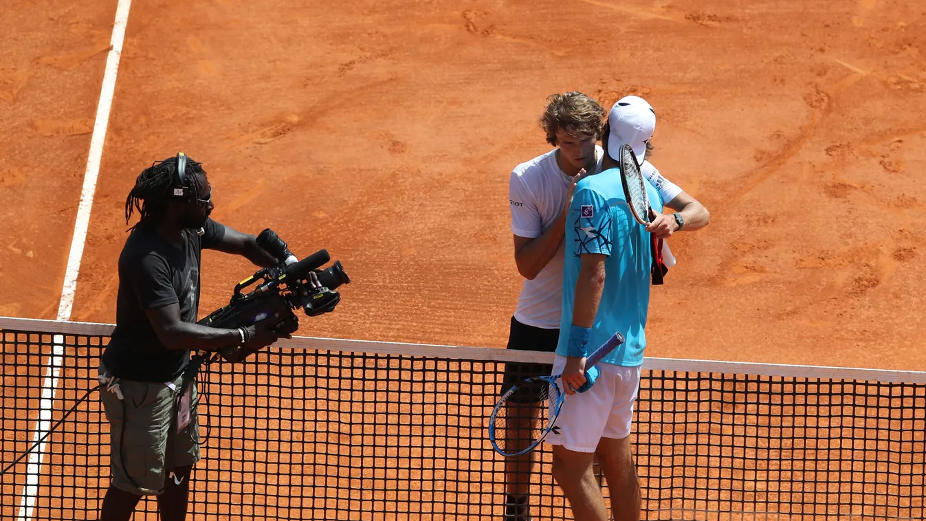 Horizontal TENNIS HIGH ANGLE JOY EMBRACE TV CAMERAMAN 