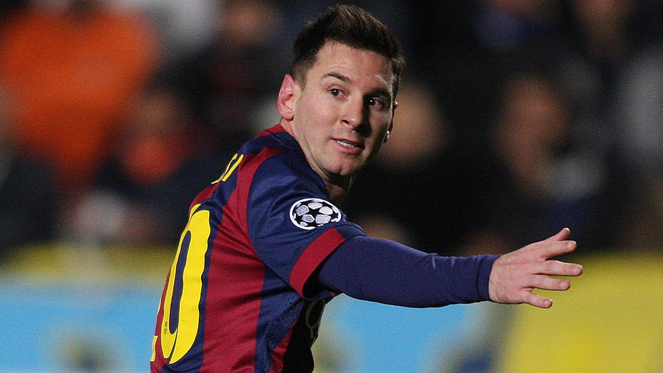 511785695 TOPSHOTS
Barcelona's Argentinian forward Lionel Messi  celebrates scoring a goal during their UEFA Champions League football match against Apeol at the Neo GSP Stadium in the Cypriot capital, Nicosia, on November 25, 2014.AFP PHOTO/ SAKIS SAVVID