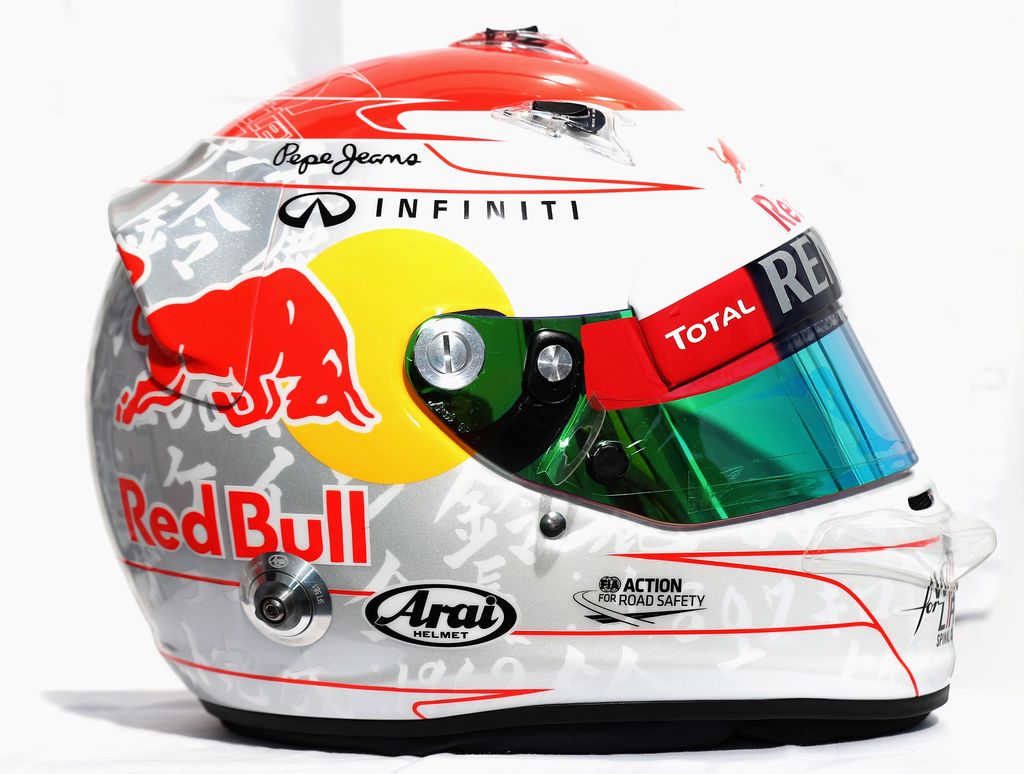 F1 Grand Prix of Japan - Practice SUZUKA, JAPAN - OCTOBER 05:  The specially designed drivers helmet of Sebastian Vettel of Germany and Red Bull Racing is seen during practice for the Japanese Formula One Grand Prix at the Suzuka Circuit on October 5, 201