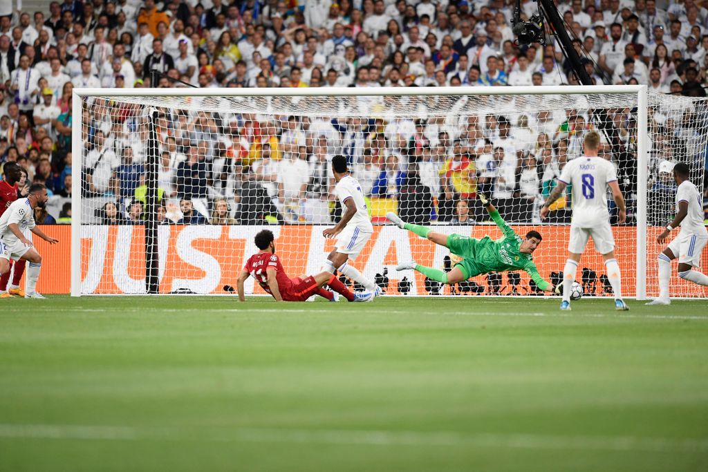 Liverpool FC v Real Madrid - UEFA Champions League Final 2021/22 players France England UK Liverpool FC Real Madrid Thibaut Courtois of Real Madrid Medium group of people makes a save UEFA Champions League final match Thibaut Courtois Stade de May Paris H