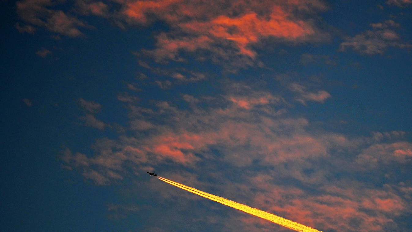 Airplane at the evening sky Weather SKY NIGHT clouds contrails ENVIRONMENT FUEL AIRCRAFT pilots Evening SUNSET HORIZONTAL 