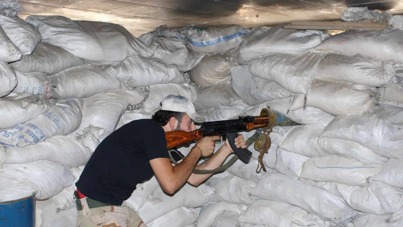 Syria update Kalashnikov fight sack barricade submachine gun SQUARE FORMAT 