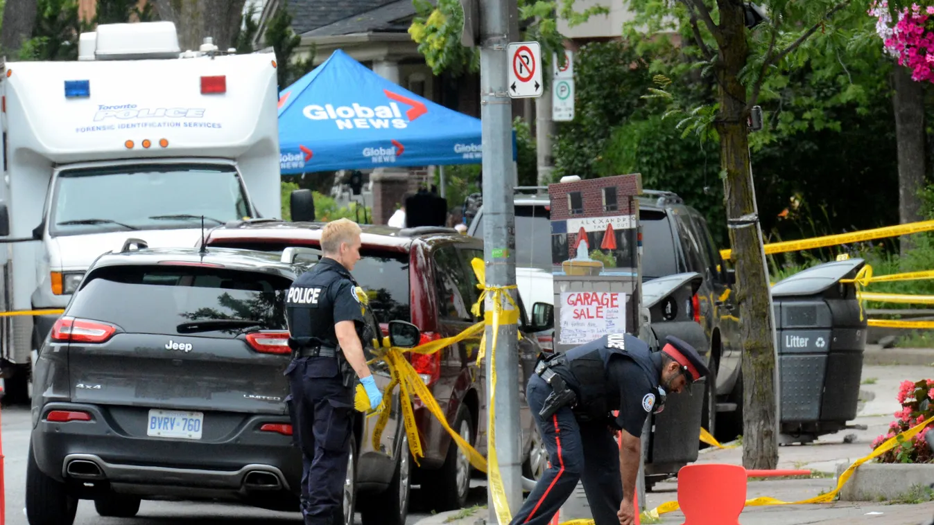 crime Horizontal Toronto Police investigate the scene of a shooting from the night before in Toronto, Ontario, Canada on July 23, 2018.  
Toronto police were seeking to determine a motive on after a 29-year-old man opened fire with a handgun on restaurant