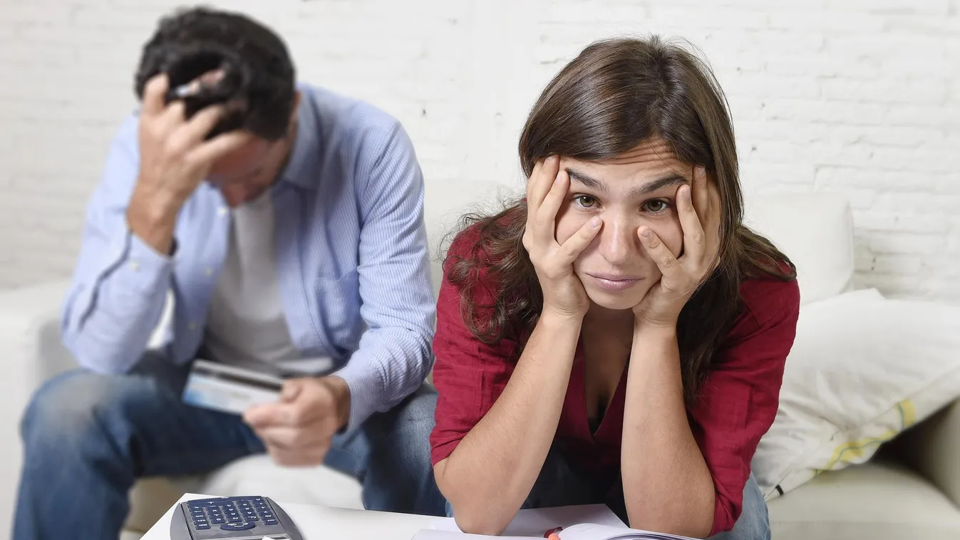 couple worried in financial bank problems accounting in stress Couple - Relationship Debt Women Men Banking Paying Accounting Ledger Currency Sitting Looking Calculating Financial Figures Problems Togetherness Emotional Stress Sadness Rudeness Despair Fin