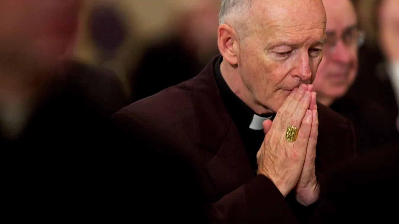 Horizontal (FILES) In this file photo taken on November 11, 2002, Archbishop of Washington Cardinal Theodore McCarrick prays during a prayer for deceased bishops at the start of the morning session of the US Conference of Catholic Bishops being held in Wa