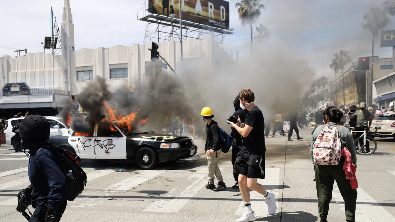 Black Lives Matter Holds Protest In Los Angeles After Death Of George Floyd GettyImageRank2 People DEATH Mode of Transport HORIZONTAL Protest Burning USA California City Of Los Angeles LAW Protestor Medium Group Of People Photography LAPD Social Movement 