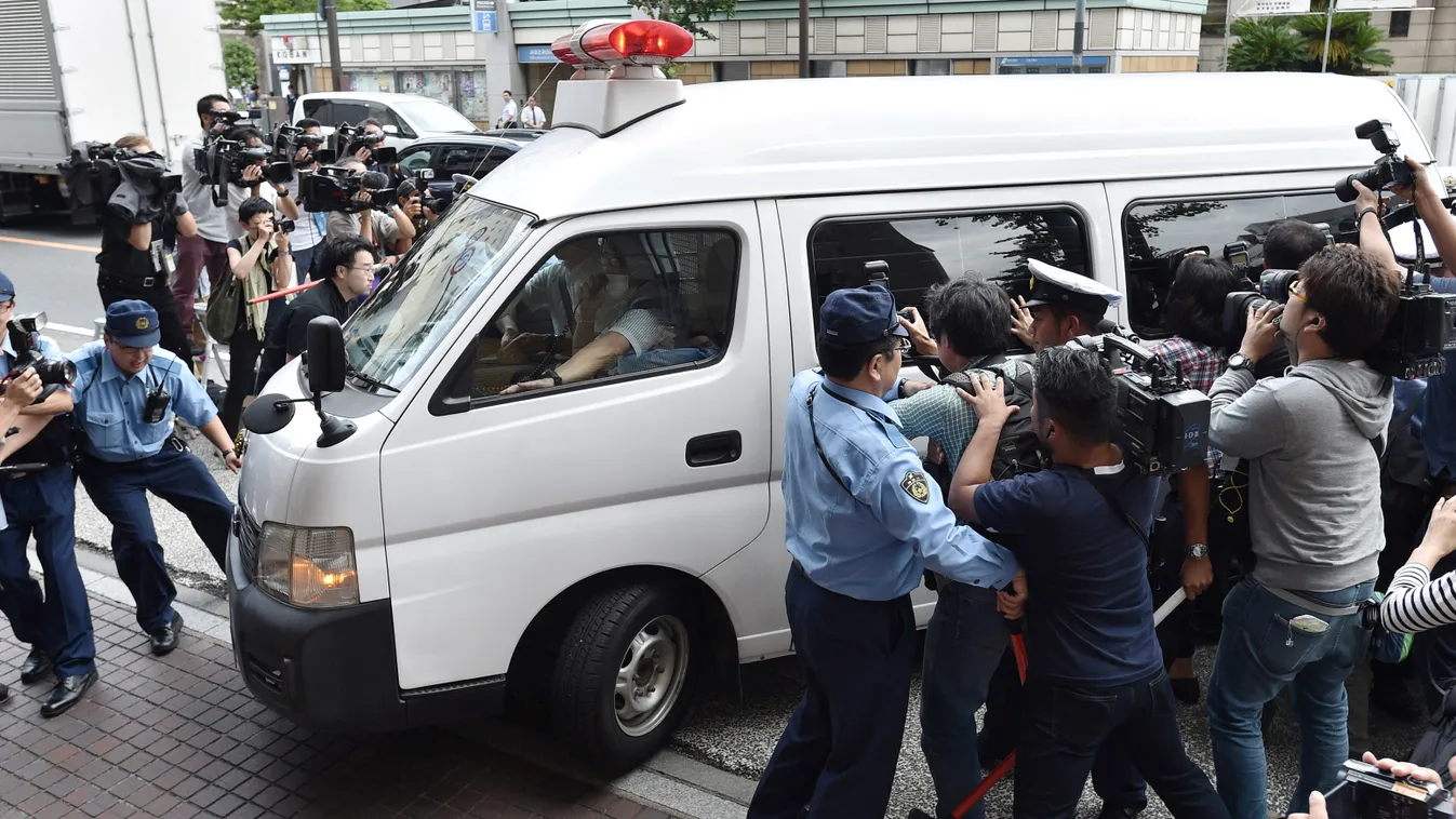 A vehicle carrying Satoshi Uematsu, enters the prosecutor's office in Yokohama, Kanagawa Prefecture on July 27, 2016. 26-year-old Uematsu alledgedly killed 19 people at Tsukui Yamayuri Garden, a social welfare facility for the disable in Sagamihara, on th