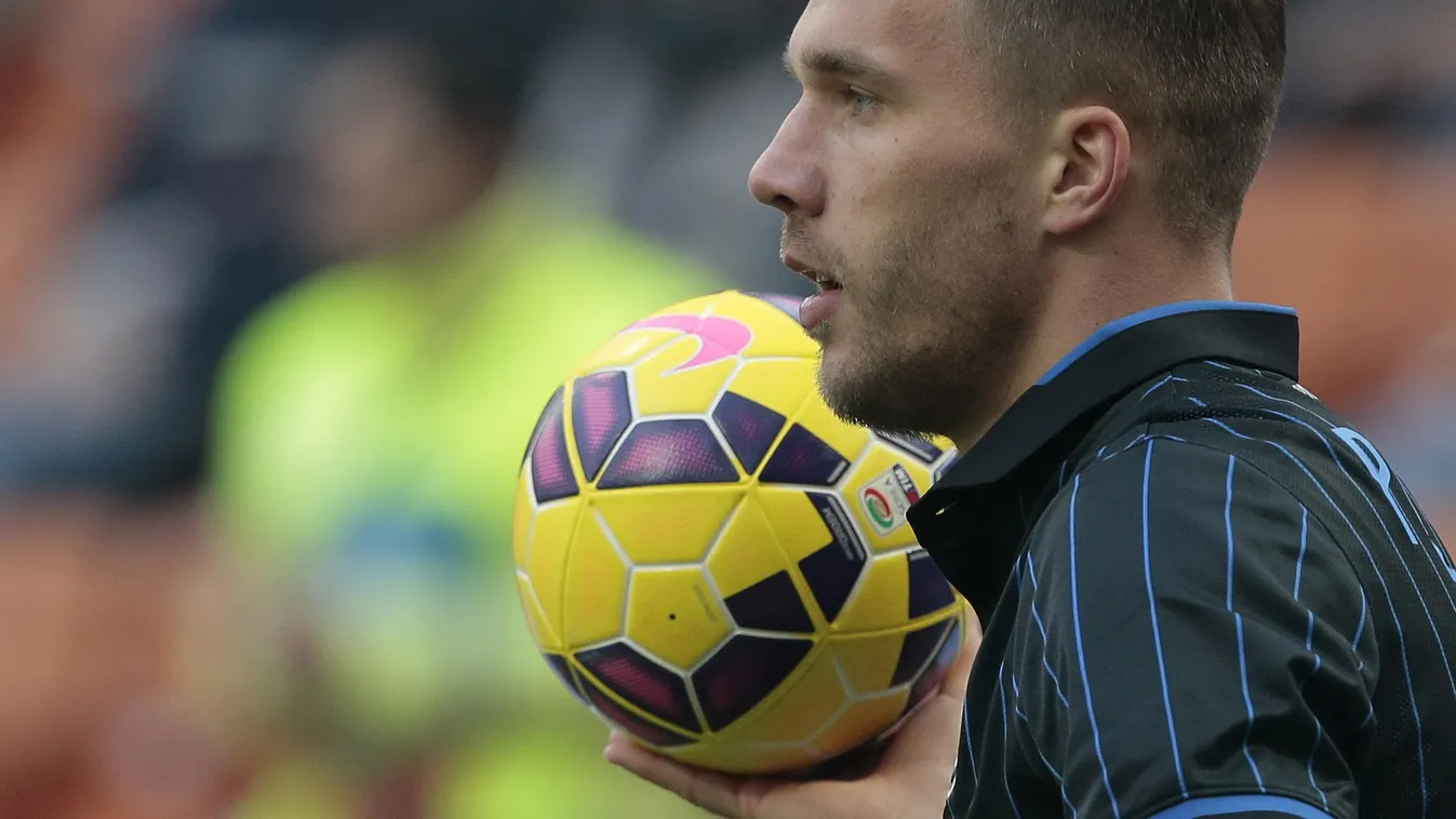 504225783 Inter Milan's Lukas Podolski is pictured during the Italian Serie A football match Inter Milan vs Genoa on January 11, 2015 at the San Siro stadium in Milan. AFP PHOTO / EMILIO ANDREOLI 