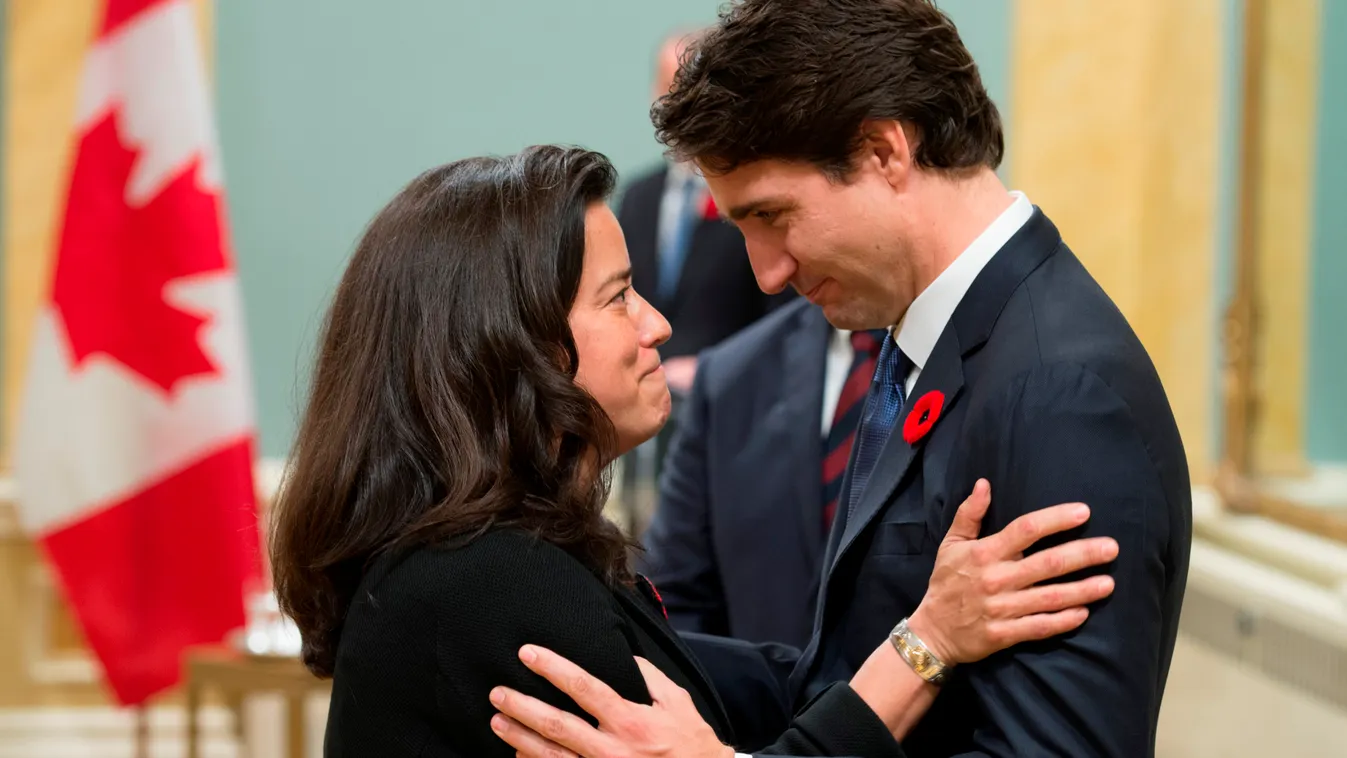 Horizontal (FILES) In this file photo taken on November 04, 2015, Canadian Prime Minister Justin Trudeau speaks with Minister of Justice Jody Wilson-Raybould during a swearing-in ceremony at Rideau Hall, Wednesday Nov.4, 2015 in Ottawa. - Canada's top bur