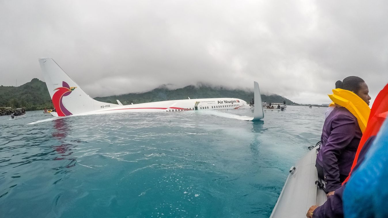 Chuuk Crash FSM PX56 UCT2 Horizontal In this photo released by the US Navy on September 28, 2018, US Navy Sailors from Underwater Construction Team (UCT) 2 assist local authorities in shuttling the passengers and crew of Air Niugini flight PX56 to shore f