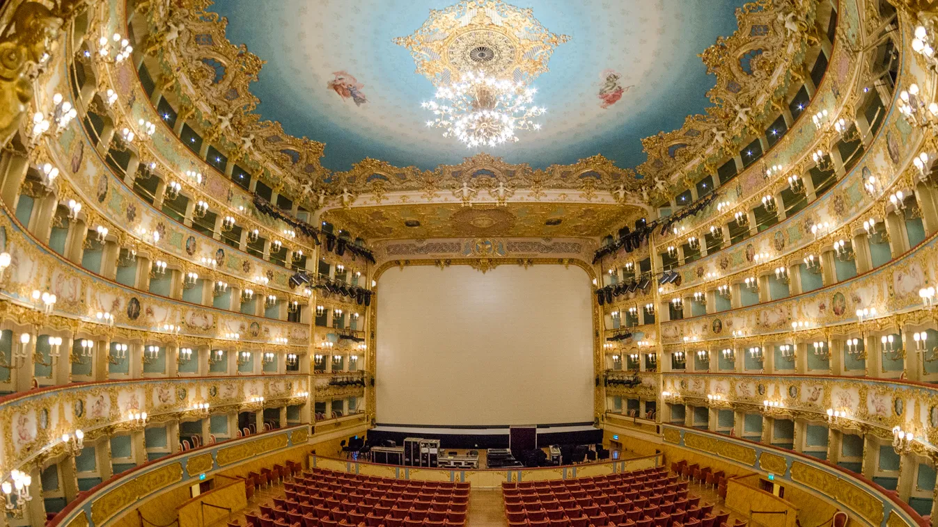 VENICE - APRIL 7, 2014: Interior of La Fenice Theatre. Teatro La Fenice, "The Phoenix", is an opera house, one of the most famous and renowned landmarks in the history of Italian theatre 