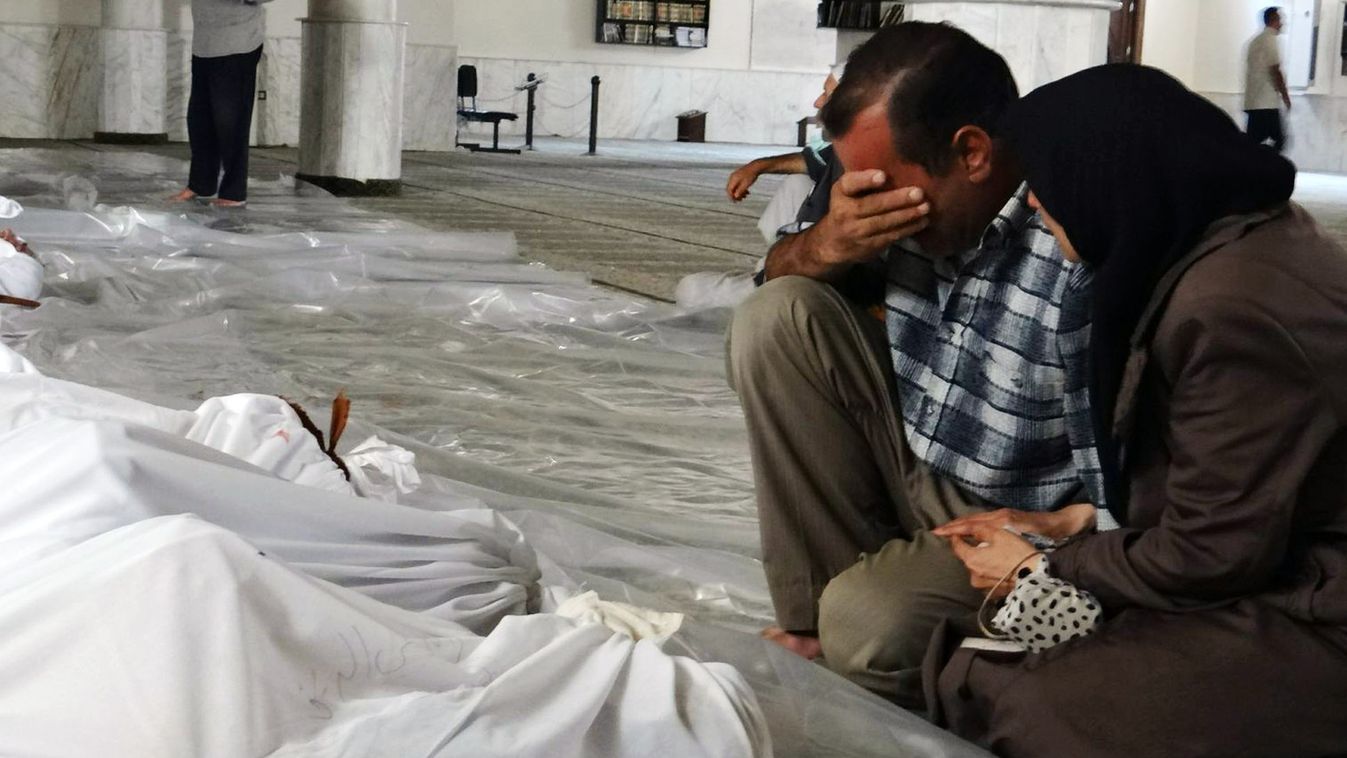 szíria, gáztámadás, vegyi fegyveres támadás, gyászoló szülők 