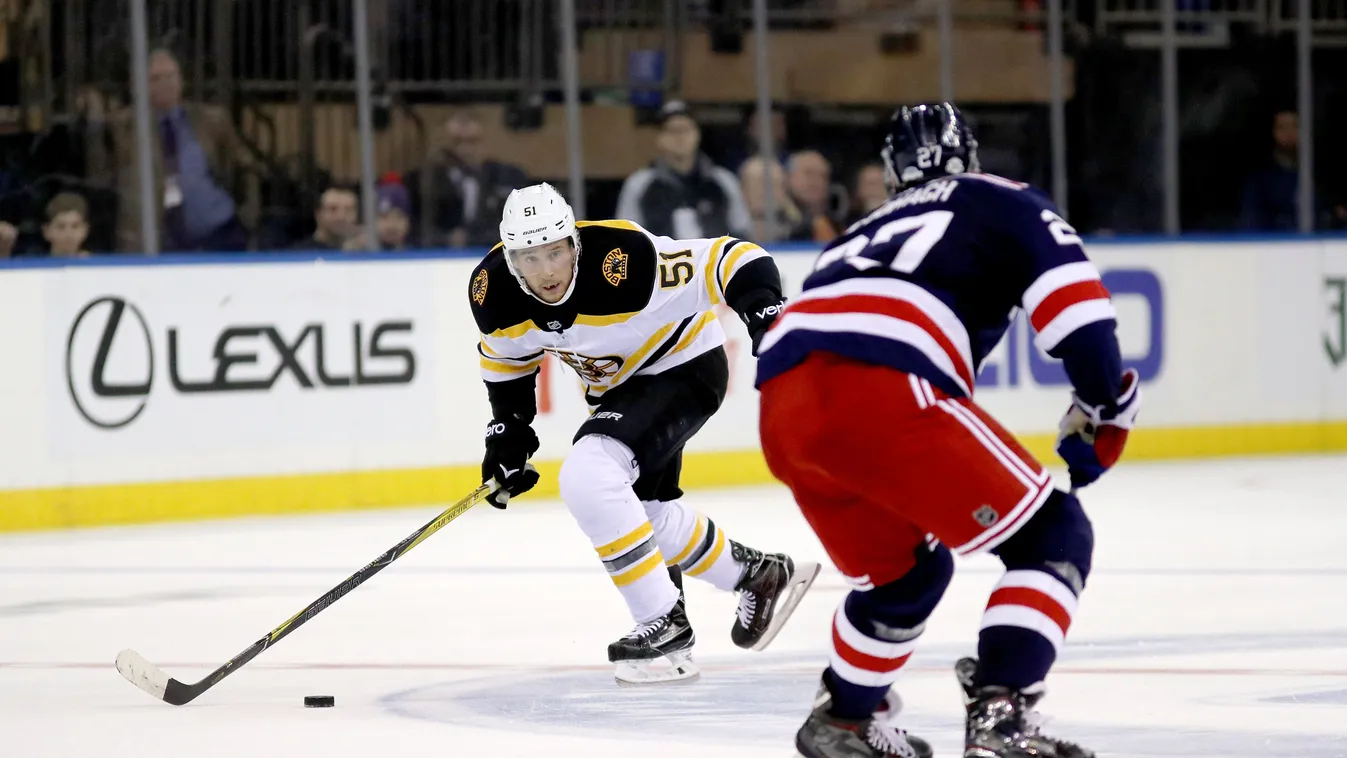 Boston Bruins v New York Rangers GettyImageRank2 SPORT HORIZONTAL ICE HOCKEY Working USA New York City Winter Sport Madison Square Garden New York Rangers Photography National Hockey League Boston Bruins Round Three Hockey Ryan McDonagh Ryan Spooner Perso