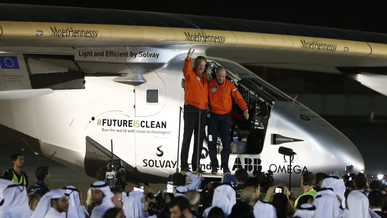 Horizontal Bertrand Piccard (R) and Andre Borschberg (L), pilots of the solar powered Solar Impulse 2 aircraft, are greeted upon arrival at Al Batin Airport in Abu Dabi to complete its world tour flight on July 26, 2016 in the United Arab Emirates.
Solar 