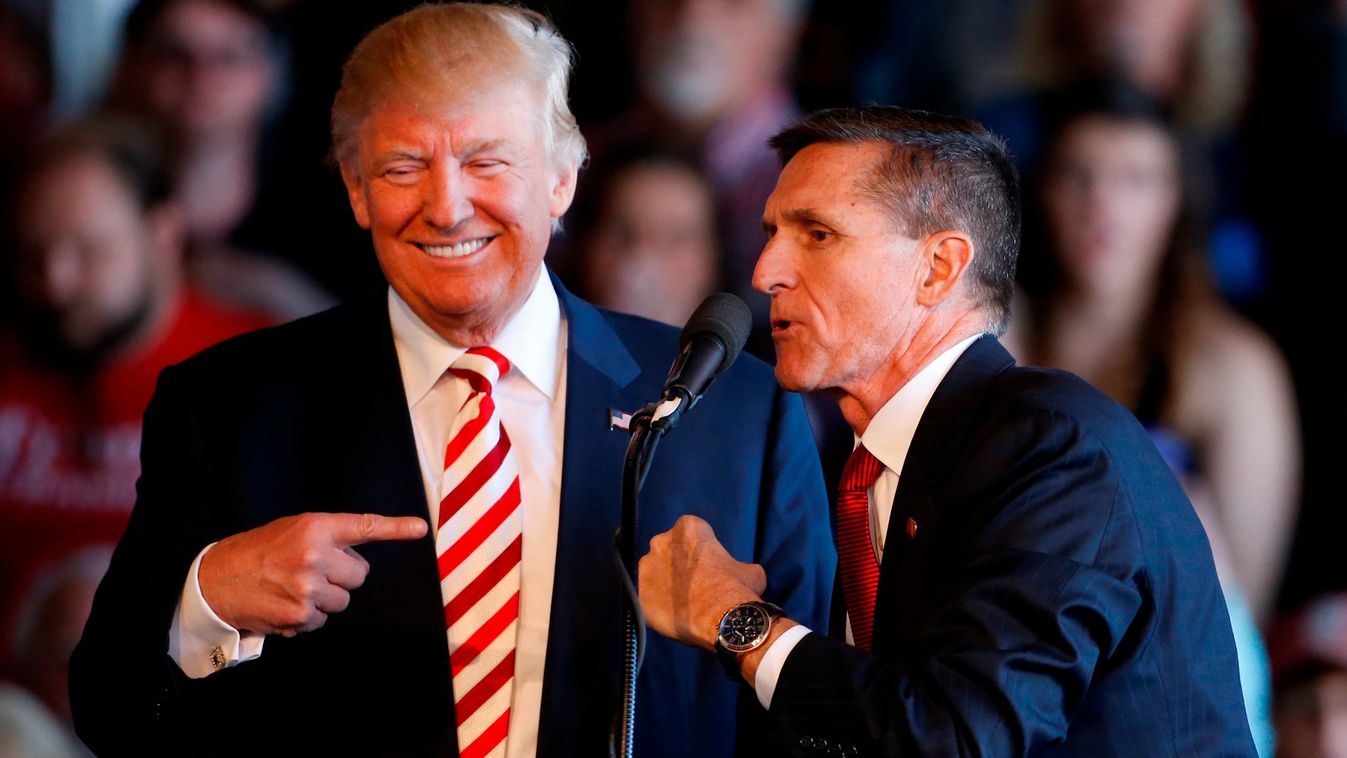 GettyImageRank2 Republican Democrate Presidential Politicts Colorado 2016 POLITICS ELECTION GRAND JUNCTION, CO - OCTOBER 18: Republican presidential candidate Donald Trump (L) jokes with retired Gen. Michael Flynn as they speak at a rally at Grand Junctio