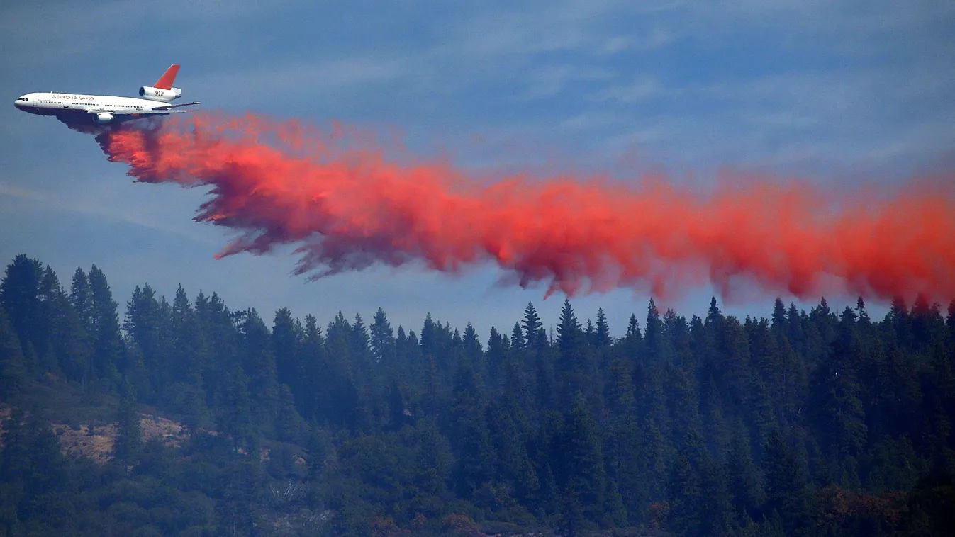 GettyImageRank2 OIL TANKER Drop HORIZONTAL Outdoors USA WIND HILL California Washington DC Emergencies and Disasters Retardant Pollock Pines Environmental Issues Pollock Pines, California Foscheck King Fire POLLOCK PINES, CA - SEPTEMBER 17: A DC-10 air ta