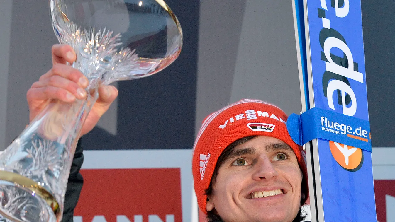 - Germany's Richard Freitag celebrates his victory on podium after the Four Hills competition of the FIS Ski Jumping World cup (Vierschanzentournee) in Innsbruck on January 4, 2015. Germany's Richard Freitag won the event ahead of Austrian Stefan Kraft (2