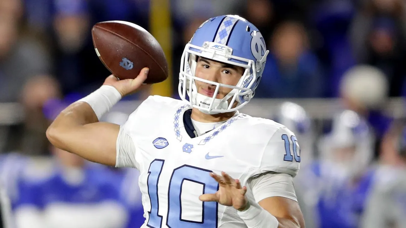 DURHAM, NC - NOVEMBER 10: Mitch Trubisky #10 of the North Carolina Tar Heels thows a pass against the Duke Blue Devils during their game at Wallace Wade Stadium on November 10, 2016 in Durham, North Carolina.   Streeter Lecka/Getty Images/AFP 