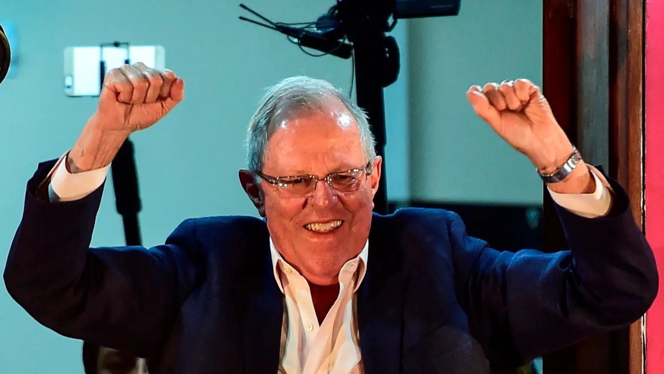 vote Horizontal Presidential candidate for the "Peruanos por el Kambio" party Pedro Pablo Kuczynski celebrates the preliminary results from the runoff elections, on June 5, 2016 in Lima.
Peruvians voted Sunday in a close-fought runoff election that will d