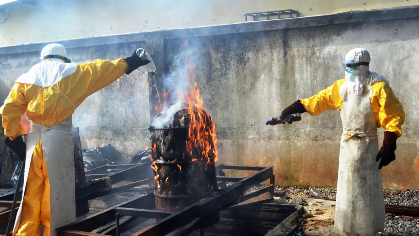 Health worker burn used protection gear at the NGO Medecins Sans Frontieres (Doctors Without Borders) center in Conakry on September 13, 2014. For nearly four decades, mention of the Ebola virus has evoked death and terror, yet a simple factor -- money 