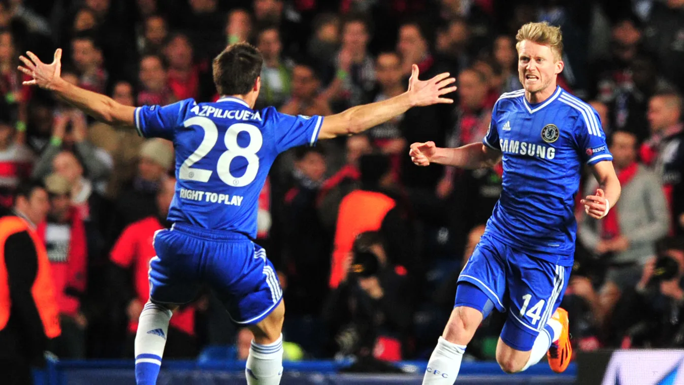481095803 Chelsea's German striker Andre Schurrle (R) celebrates scoring the opening goal during the UEFA Champions League quarter final second leg football match between Chelsea and Paris Saint-Germain at Stamford Bridge in London on April 8, 2014. AFP P
