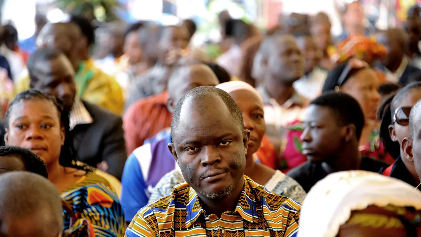Horizontal People look on during a ceremony in Nation Square in Ouagadougou on January 25, 2016, in tribute to the victims of the January 15 attack which killed 30 people. 
The first such attack in Burkina Faso, it was claimed by Al-Qaeda in the Islamic M