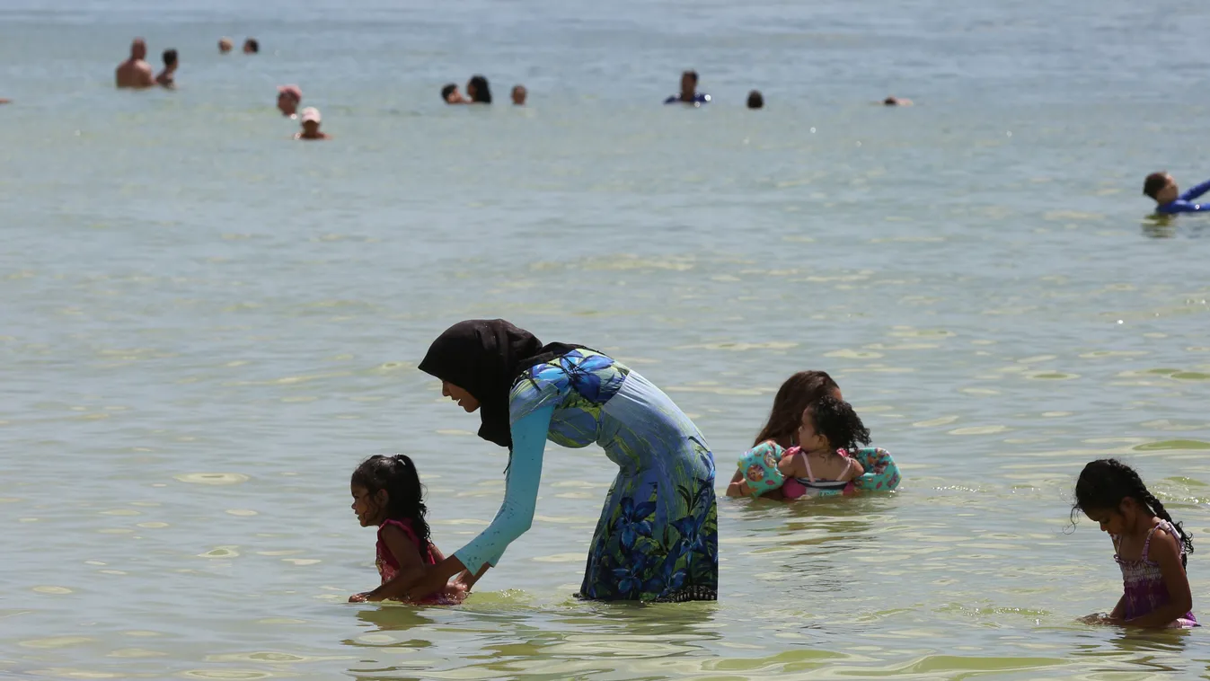 San Marco Beach On Marco Island, Florida burkini covered hijab MUSLIM Muslims Islam Islamic RELIGION CLERIC faith FASHION Florida Florida Panhandle South Florida GULF Gulf Coast Gulf of Mexico Southwest Florida coast Southern United States USA American NO