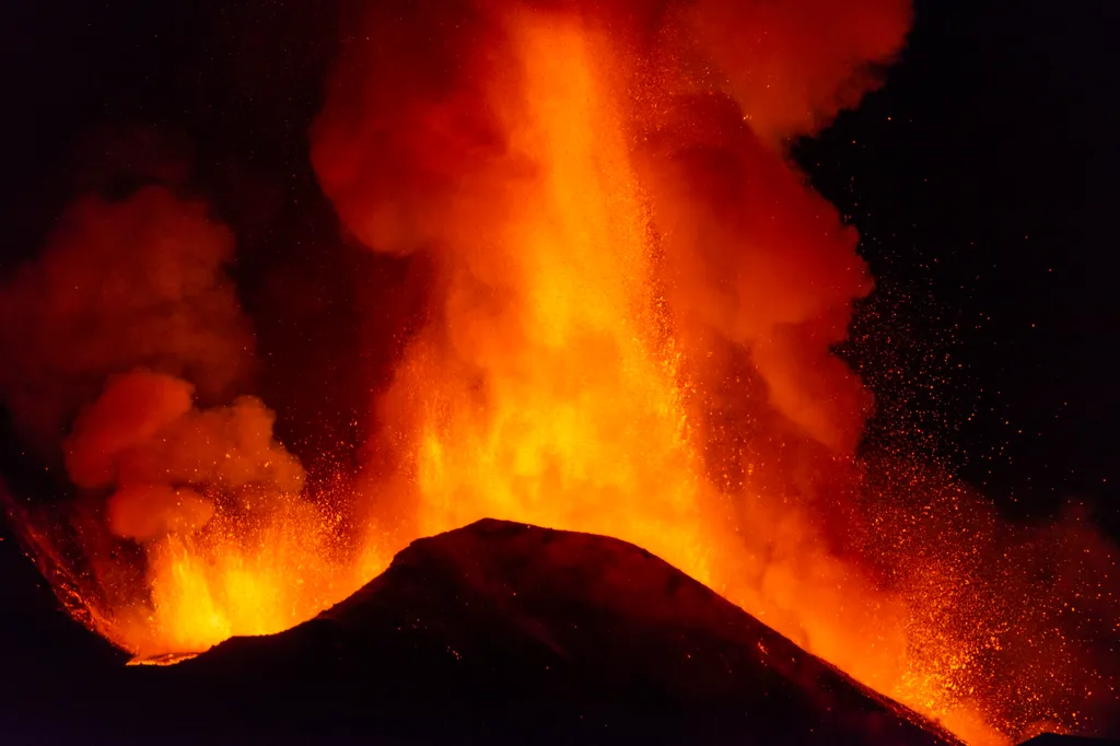 CATANIA, ITALY - FEBRUARY 23: Eruption at Mount Etna, in the early night there was a major increase in volcanic activity at the Southeast Crater, followed high lava fountains and lava flows along the flanks of the Southeast crater, photo taken at 1800 met