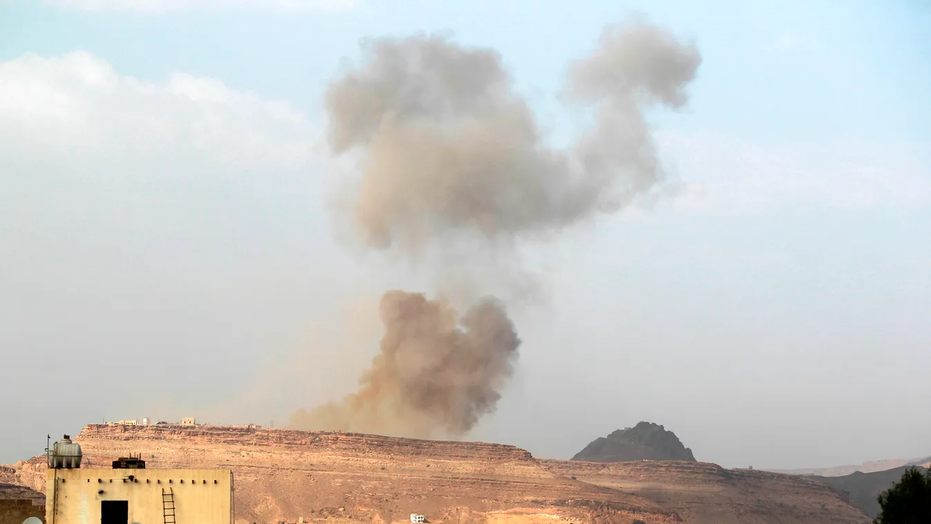 Smoke billows following an air-strike by the Saudi-led coalition on a weapons depot, currently controlled by Yemeni Shiite Huthi rebels, on July 6, 2015 in the capital Sanaa. Saudi-led warplanes have bombed the headquarters of the Yemeni party headed by f