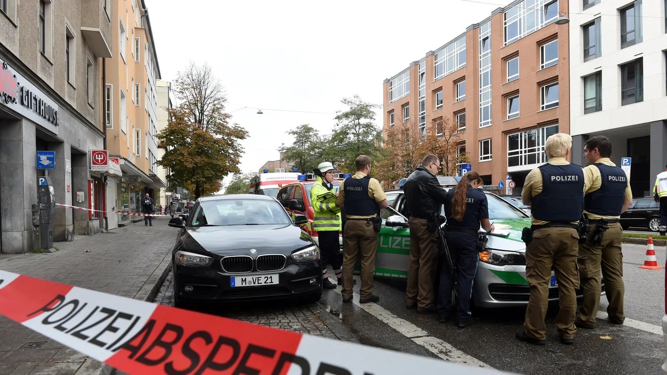 police Horizontal German police stands inside a security perimeter set after a man attacked passersby near Rosenheimer square in the southern German city of Munich on October 21, 2017.
The man attacked passersby in five places near Rosenheimer Platz in th