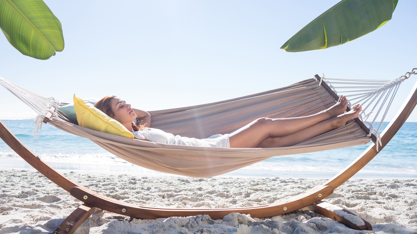 Brunette relaxing in the hammock Beautiful Napping Leisure Activity Holiday Young Women Women Females Sundress Coastline Cute 25-29 Years 20-29 Years Young Adult Smiling Sleeping Resting Caucasian Ethnicity Relaxation Carefree Freedom Joy Bright Vacations
