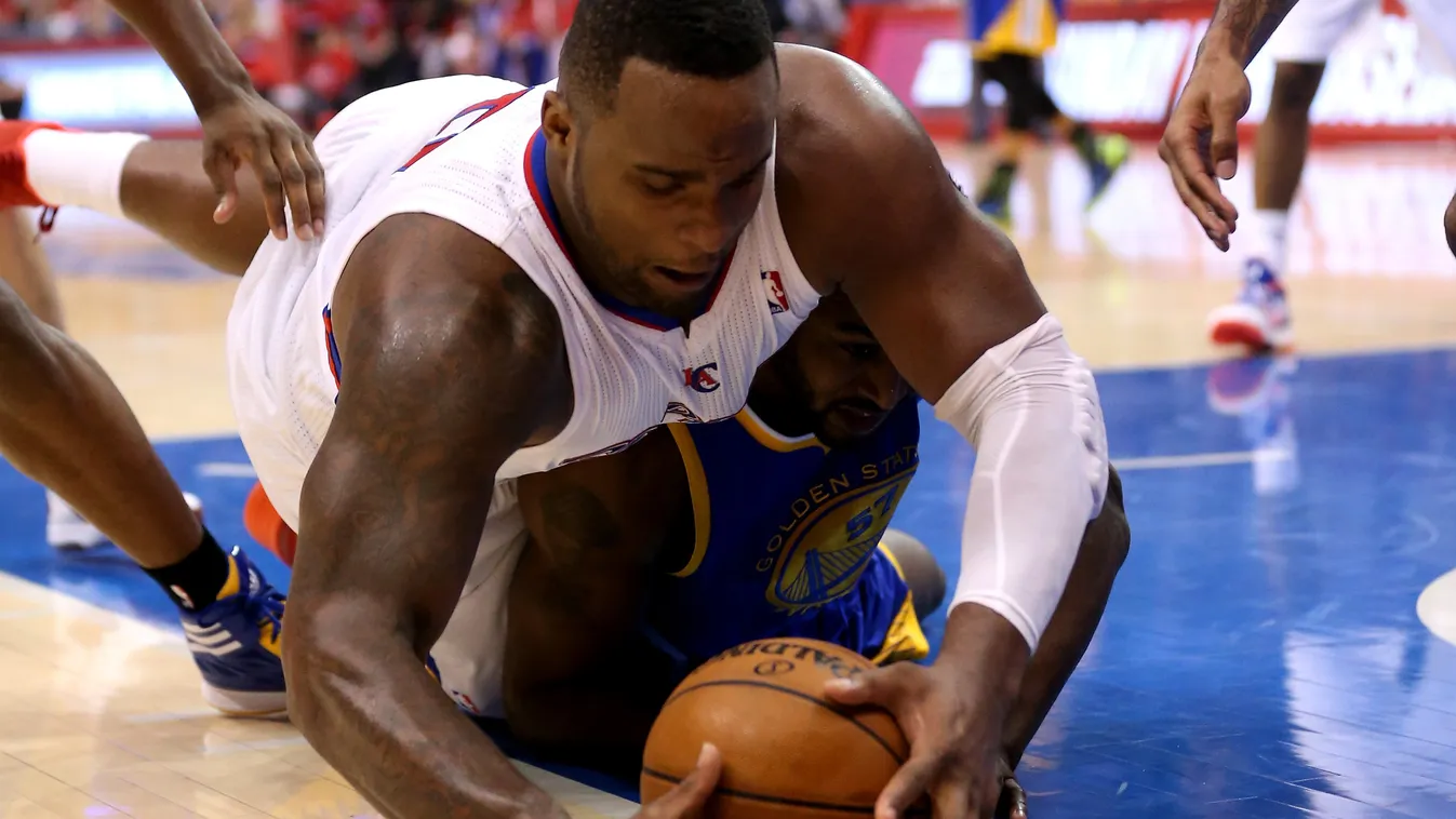 Golden State Warriors v Los Angeles Clippers - Game One GettyImageRank2 Diver SPORT HORIZONTAL Full Length Ball BASKETBALL USA California City Of Los Angeles Staples Center Loose Golden State Warriors Los Angeles Clippers NBA Quarterfinal Round Basketball