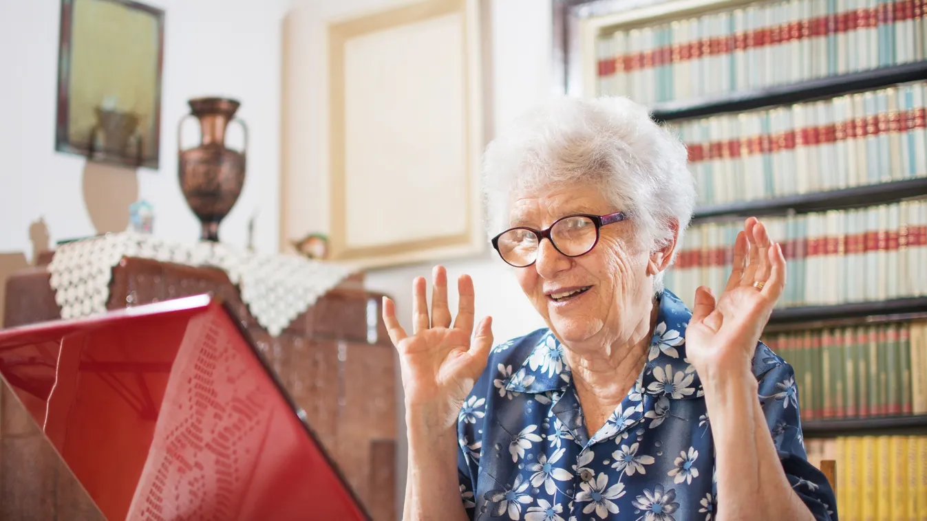 Surprised senior woman sitting in front of laptop at home. Beautiful Computer Senior Women Women Females Comfortable Retirement Cute Senior Adult Mature Adult Smiling Sitting Reading Looking Caucasian Ethnicity One Person Communication Relaxation Joy Enjo