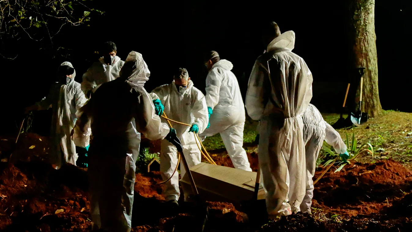 health pandemic virus Horizontal CEMETERY (FILES) This file photo taken on March 31, 2021, shows a coffin being buried at the Vila Formosa cemetery in Sao Paulo, Brazil. - Brazil registered more than 4,000 Covid-19 deaths in 24 hours for the first time Tu