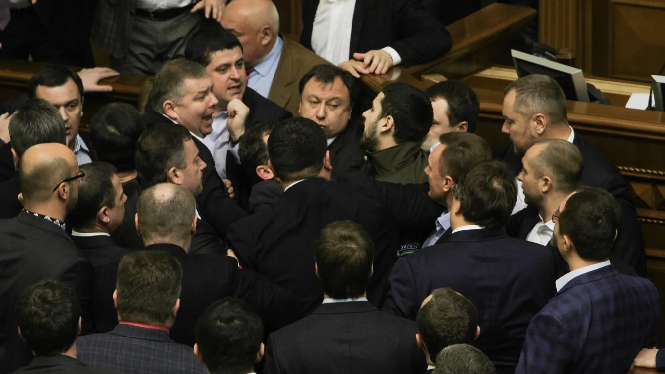 Ukrainian PM attacked during his annual report Kiev Kyiv PRIME MINISTER GOVERNMENT PARLIAMENT report scuffle ukraine verkhovna rada SQUARE FORMAT 